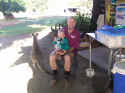 Ken and baby Isabel and Midget the kangaroo.